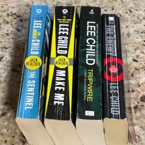 1 Lee Child and Andrew Child and 3 Lee Child  paperback books. See photo.